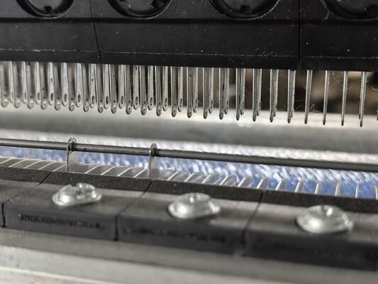 Die Rolle von Führungsstangen in Kettenwirkmaschinen verstehen